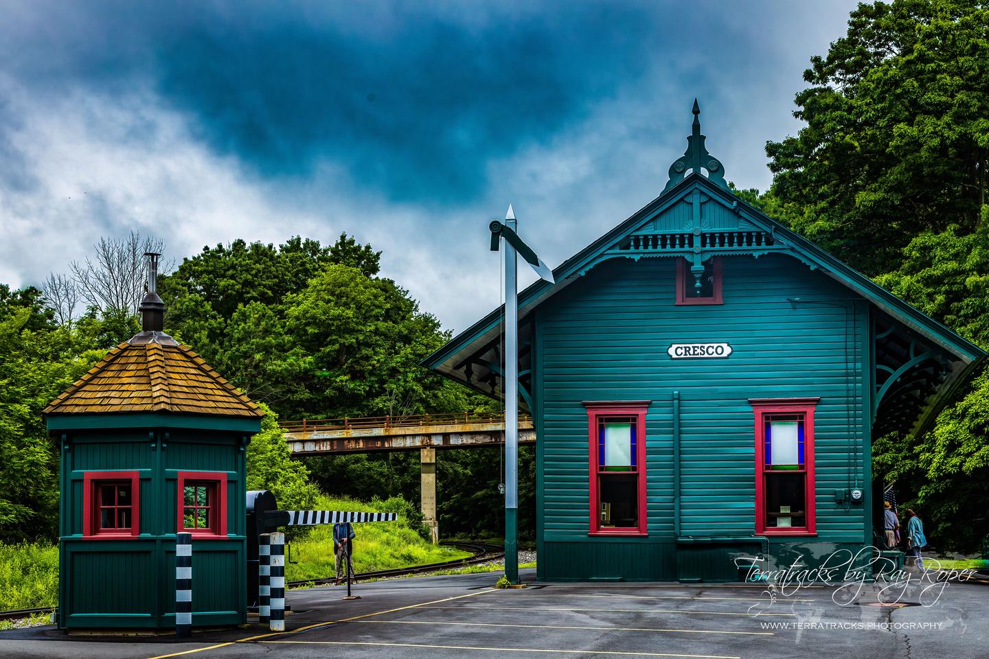 Dramatic color photo of Cresco station and buildings.The Barrett Township Historical Society maintains the Cresco Station Museum and the Library Research Center buildings providing many displays and exhibits that not only help preserve these items of the history of the area, but also tell the stories of the communities past.