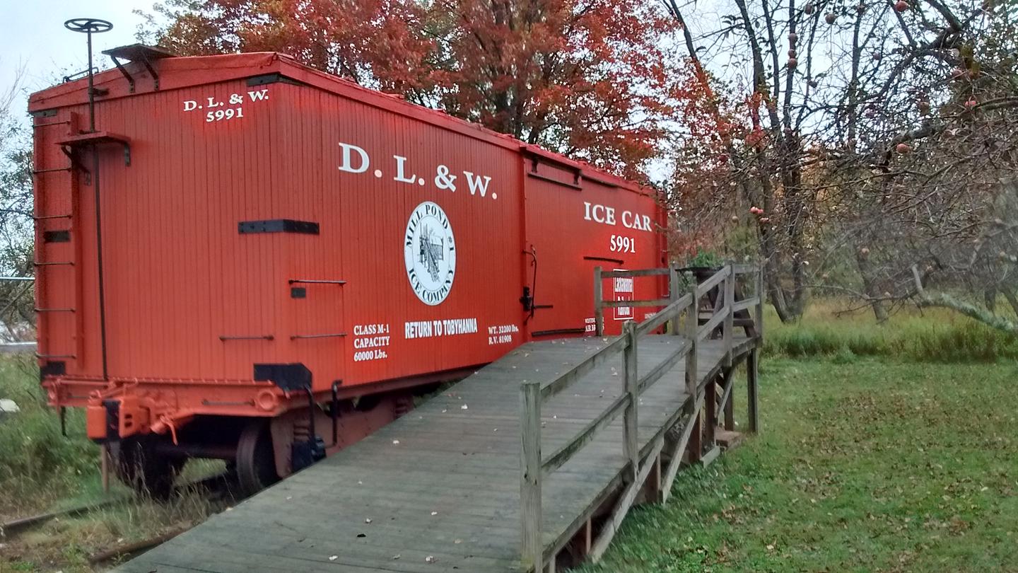 Box car with a ramp leading to the door.Ice Harvesting was a major industry in the Poconos in the early 1900s. Railroads were critical for the shipment of harvested ice to metropolitan areas.