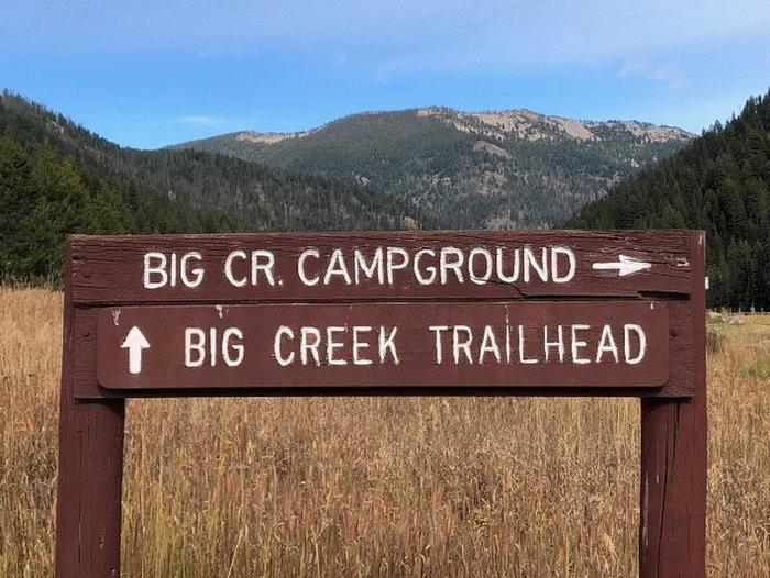 Big Creek Campground sign with mountains in the background.Big Creek Campground sign