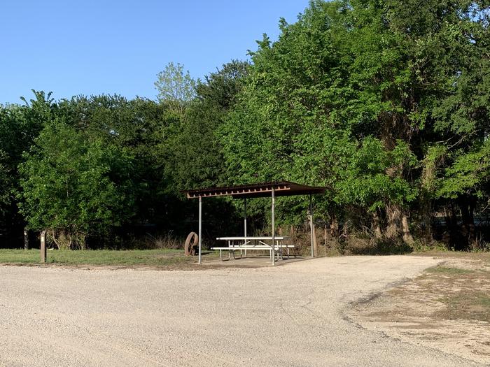 A photo of Site 071 of Loop HOLIDAY CAMPGROUND at Holiday (Texas) with Picnic Table, Fire Pit, Shade