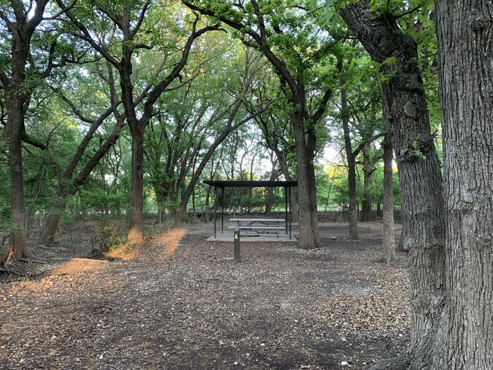 A photo of Site 099 of Loop HOLIDAY CAMPGROUND at Holiday (Texas) with Picnic Table, Fire Pit, Shade