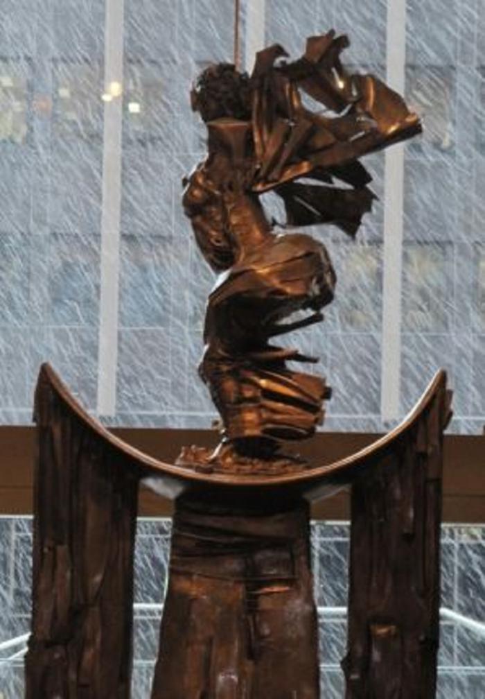 The sculpture, Africa Rising, with snow falling outside.Africa Rising by Barbara Chase-Riboud.