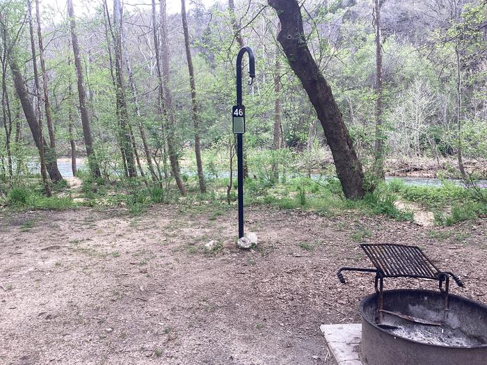 A photo of Site 046 of Loop Sites 31-55 at PULLTITE with Fire Pit, Waterfront, Lantern Pole