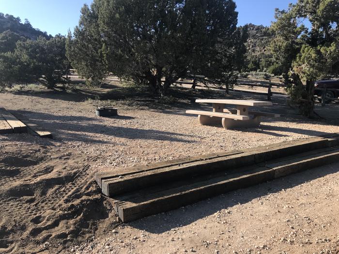 An evening photo of Site 3 at Rocky Peak Campground with Picnic Table, Fire Pit, Shade