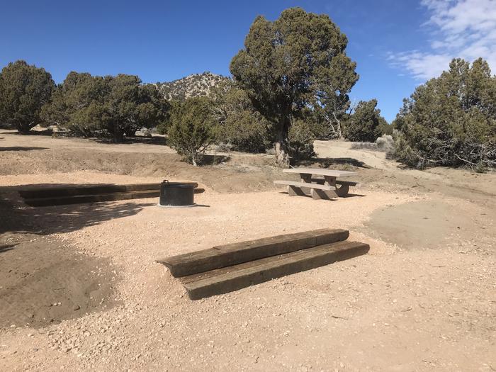 A photo of Site 6 at Rocky Peak Campground with Picnic Table and Fire RingSite 6 at Rocky Peak Campground with Picnic Table and Fire Ring