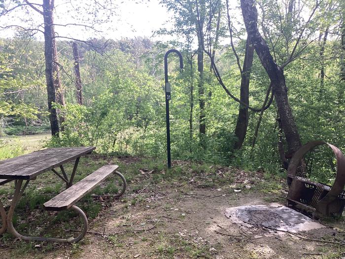 A photo of Site 031 of Loop Sites 2-29, 30-49, E1-E6 at ROUND SPRING with Picnic Table, Fire Pit, Shade, Lantern Pole