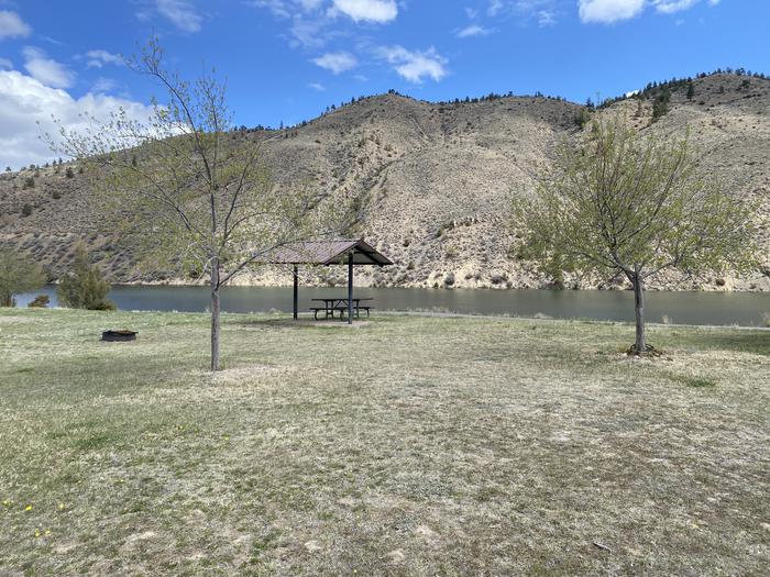 A photo of Site 47 of Loop TENT at Devil's Elbow Campground with Boat Ramp, Picnic Table, Shade