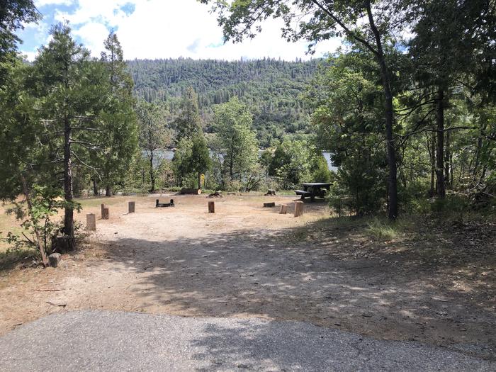 A photo of Site 007 of Loop WISHON BASS LAKE at WISHON BASS LAKE with Picnic Table, Fire Pit, Shade, Lake View Next to Restrooms. 
