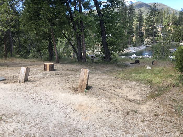 A photo of Site 005 of Loop WISHON BASS LAKE at WISHON BASS LAKE with Picnic Table, Fire Pit, Shade. Pull thru, lake view, Across from Restrooms. 