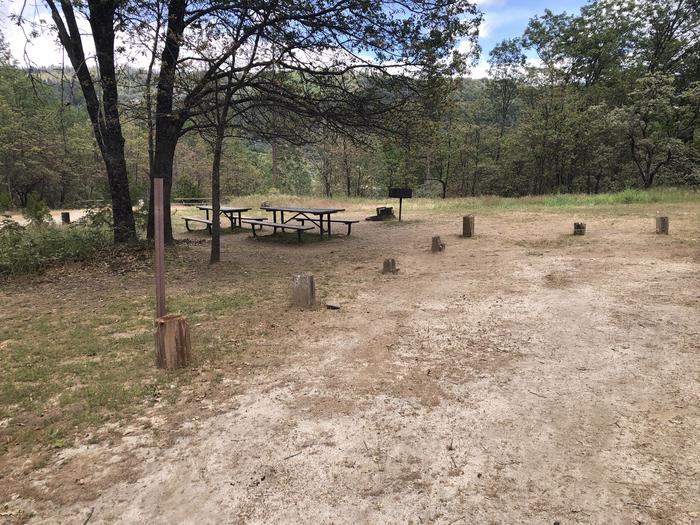 A photo of Site 028 of Loop WISHON BASS LAKE at WISHON BASS LAKE with Picnic Table, Fire Pit, Shade, Double Site. 