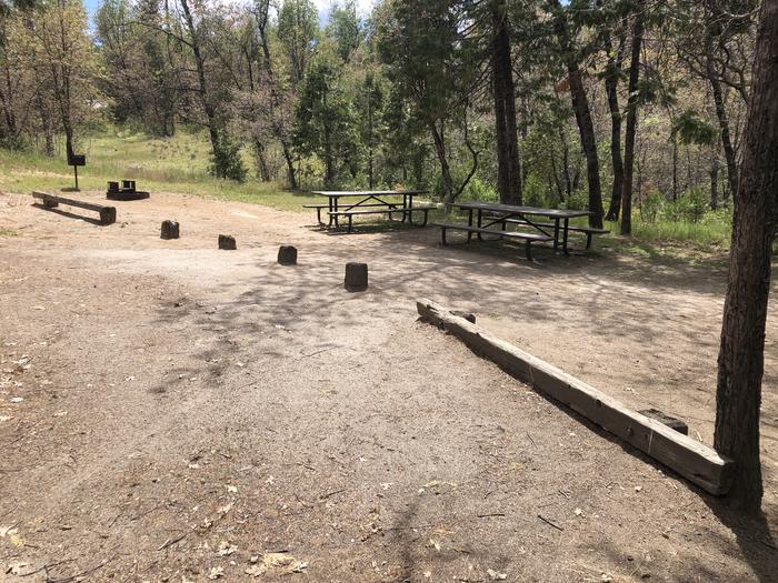 A photo of Site 018 of Loop WISHON BASS LAKE at WISHON BASS LAKE with Picnic Table, Fire Pit, Shade, Double Site, Pull-Thru, Across from Restrooms. 