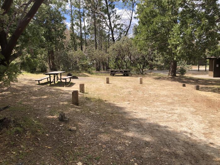 A photo of Site 021 of Loop WISHON BASS LAKE at WISHON BASS LAKE with Picnic Table, Fire Pit, Shade, Double Site, Next to Restrooms. 