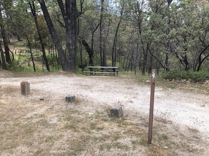 A photo of Site 027 of Loop WISHON BASS LAKE at WISHON BASS LAKE with Picnic Table, Fire Pit, Shade, Pull-Thru. 