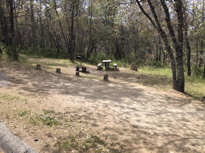 A photo of Site 022 of Loop WISHON BASS LAKE at WISHON BASS LAKE with Picnic Table, Fire Pit, Shade, Pull-thru. 