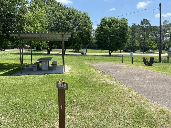 A photo of Site 105 of Loop D at MILL CREEK (TEXAS) with Picnic Table, Electricity Hookup, Fire Pit, Lantern Pole, Water Hookup, Lean To / Shelter