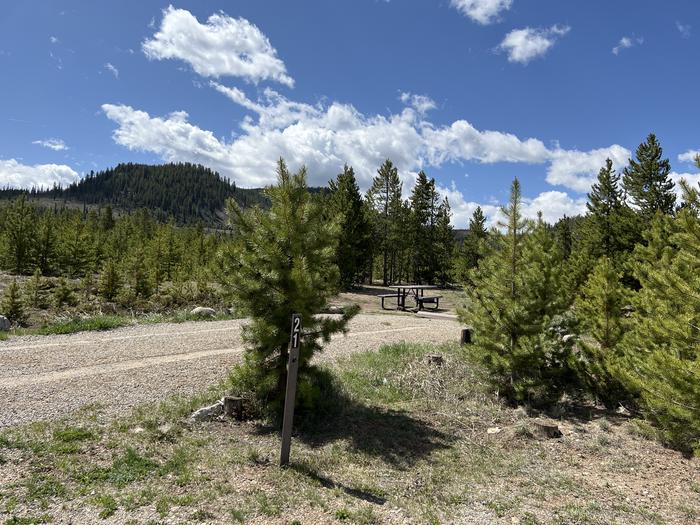 A photo of Site 021 of Loop B at PROSPECTOR with Picnic Table, Fire Pit, Tent Pad
