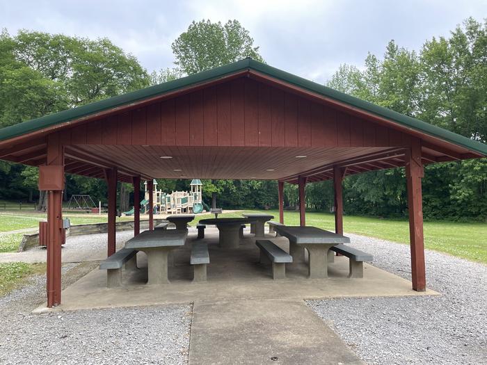 Four picnic tables.  round table no seats