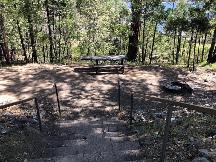 A photo of Site 014 of Loop SPRING COVE at SPRING COVE with Picnic Table, Fire Pit, Shade, Food Storage, Tent Pad, Lake View