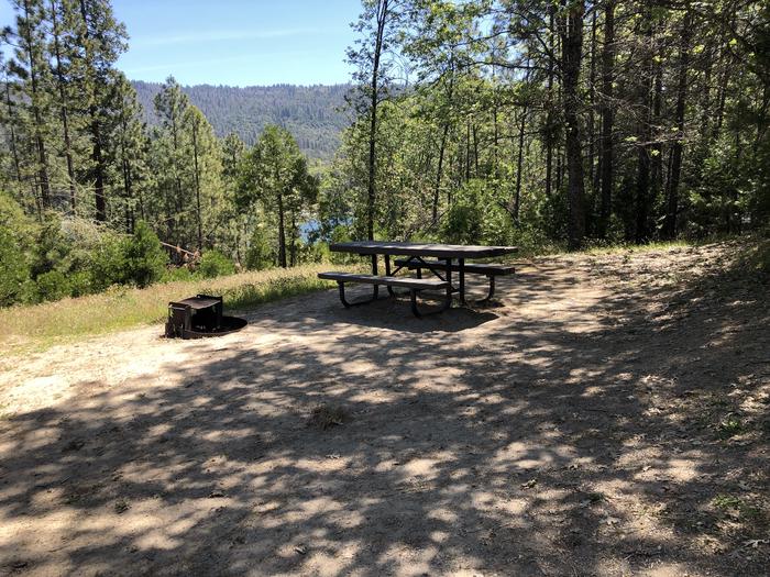 A photo of Site 104 of Loop 94-113 at LUPINE with Picnic Table, Fire Pit, Shade, Tent Pad