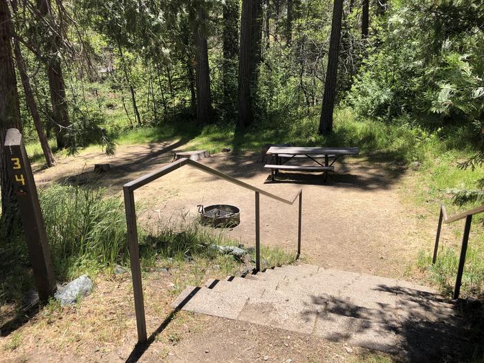 A photo of Site 034 of Loop SPRING COVE at SPRING COVE with Picnic Table, Fire Pit, Shade, Food Storage, Tent Pad