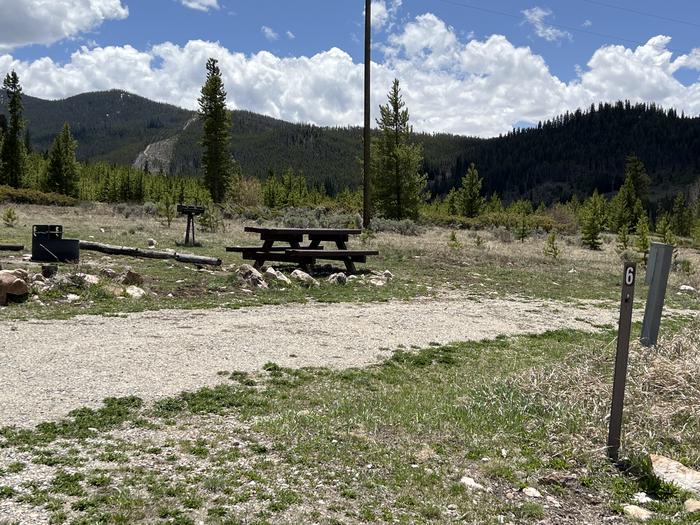 A photo of Site 006 of Loop LOWR at LOWRY CAMPGROUND with Picnic Table, Electricity Hookup, Fire Pit, Food Storage, Tent Pad