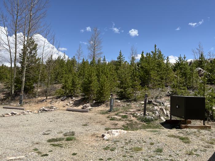 A photo of Site 012 of Loop LOWR at LOWRY CAMPGROUND with Picnic Table, Electricity Hookup, Fire Pit, Food Storage, Tent Pad