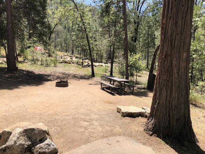 A photo of Site 011 of Loop FORKS CAMPGROUND at Forks Campground (Sierra) with Picnic Table, Fire Pit, Shade, Tent Pad