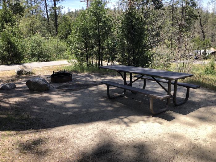 A photo of Site 018 of Loop FORKS CAMPGROUND at Forks Campground (Sierra) with Picnic Table, Fire Pit, Shade, Tent Pad
