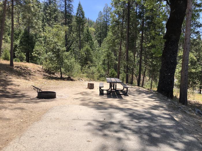 A photo of Site 022 of Loop FORKS CAMPGROUND at Forks Campground (Sierra) with Picnic Table, Fire Pit, Shade, Tent Pad