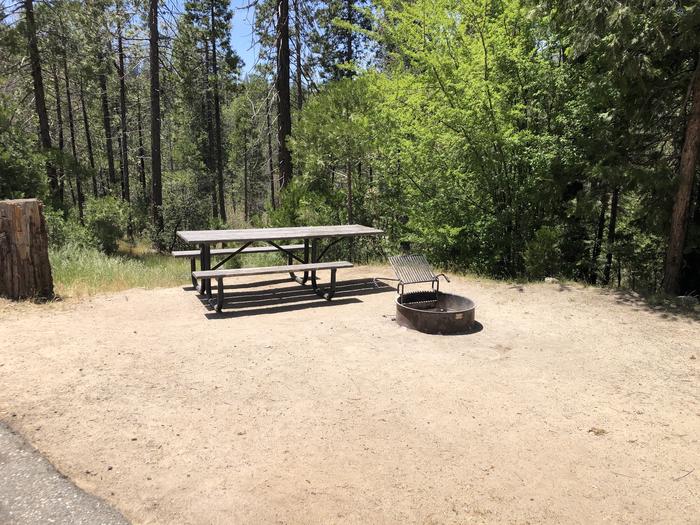 A photo of Site 021 of Loop FORKS CAMPGROUND at Forks Campground (Sierra) with Picnic Table, Fire Pit, Shade, Tent Pad