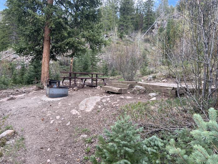 A photo of Site 23 of Loop GORE CREEK CAMPGROUND at GORE CREEK CAMPGROUND with Picnic Table, Fire Pit, Food Storage, Tent Pad