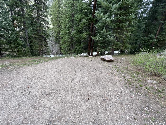 A photo of Site 13 of Loop GORE CREEK CAMPGROUND at GORE CREEK CAMPGROUND with Picnic Table, Fire Pit, Food Storage, Tent Pad, Waterfront