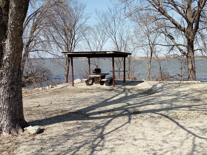 A photo of Site 18 of Loop CCRE at CANNING CREEK with Boat Ramp, Picnic Table, Electricity Hookup, Fire Pit, Shade, Waterfront, Water Hookup