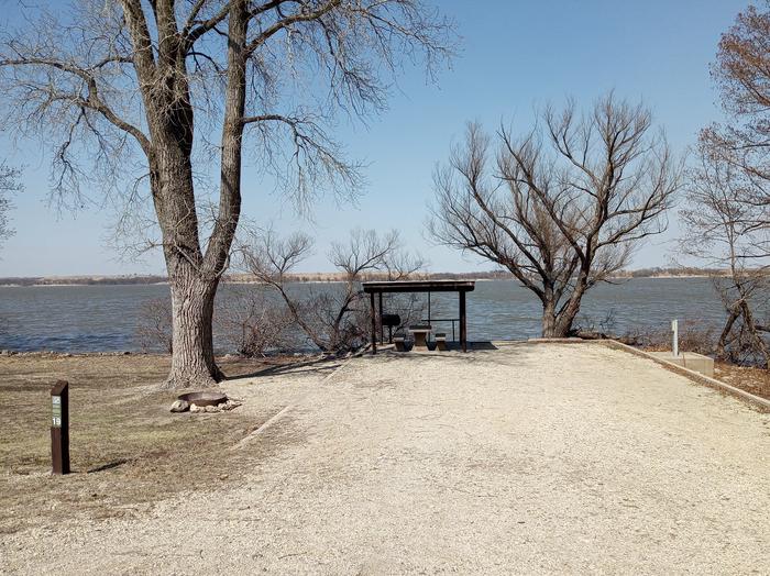A photo of Site 19 from roadA photo of Site 19 of Loop CCRE at CANNING CREEK with Picnic Table, Electricity Hookup, Fire Pit, Shade, Waterfront, Water Hookup