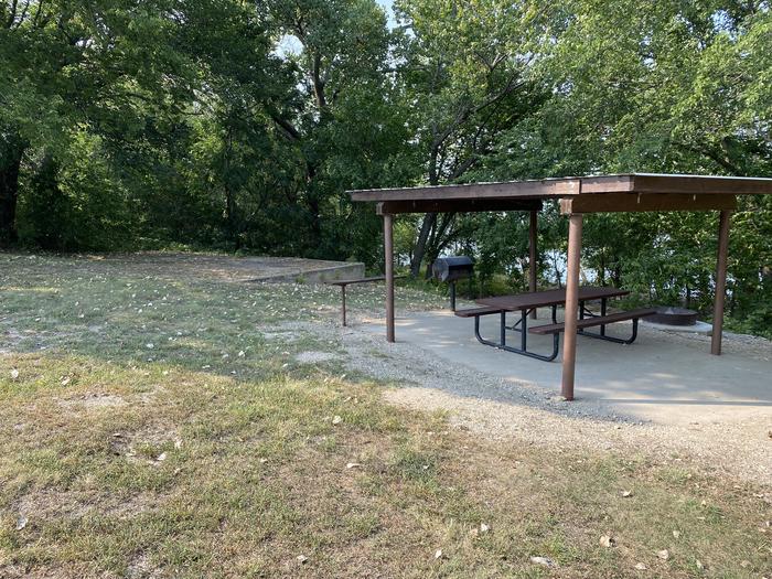 A photo of Site 24 of Loop CCRE at CANNING CREEK with Picnic Table, Fire Pit, Shade, Tent Pad, Waterfront