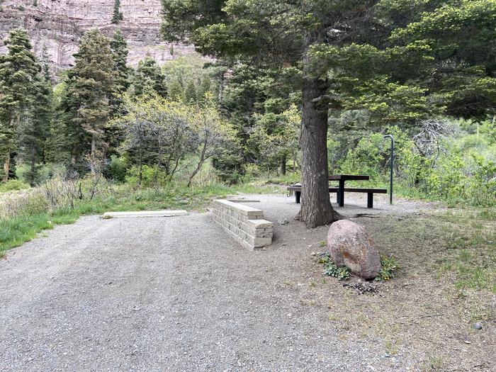 A photo of Site 024 of Loop AMPHITHEATER  at AMPHITHEATER (CO) with Picnic Table, Fire Pit, Tent Pad, Lantern Pole