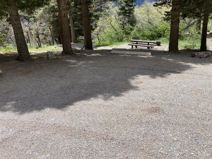 A photo of Site 008 of Loop AMPHITHEATER  at AMPHITHEATER (CO) with Picnic Table, Fire Pit, Tent Pad, Lantern Pole. Store 8 and 9 share a large parking pad and a great for two family’s or groups. 