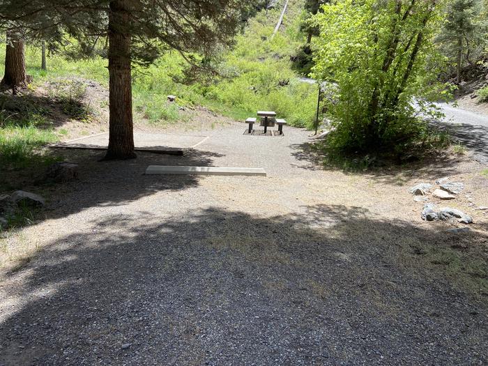 A photo of Site 012 of Loop AMPHITHEATER  at AMPHITHEATER (CO) with Picnic Table, Fire Pit, Tent Pad, Lantern Pole. A very nice and shady site. 