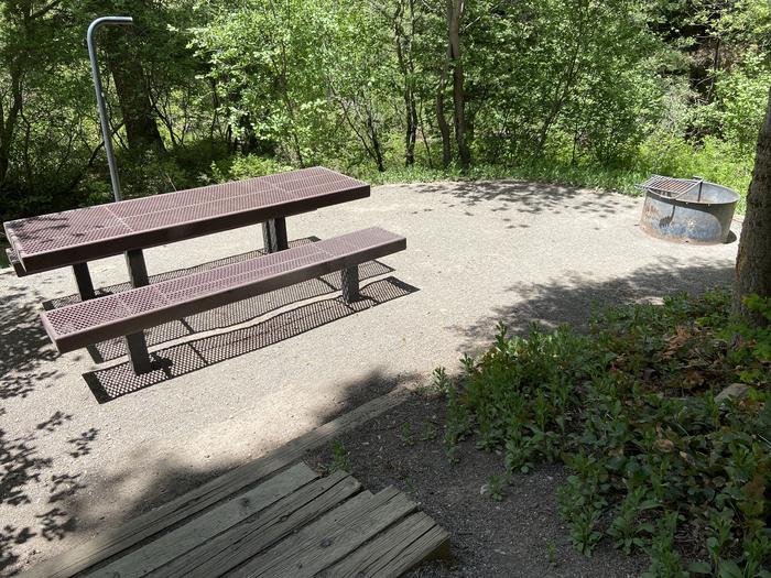 A photo of Site 002 of Loop AMPHITHEATER  at AMPHITHEATER (CO) with Picnic Table, Fire Pit, Shade, Tent Pad, Lantern Pole
