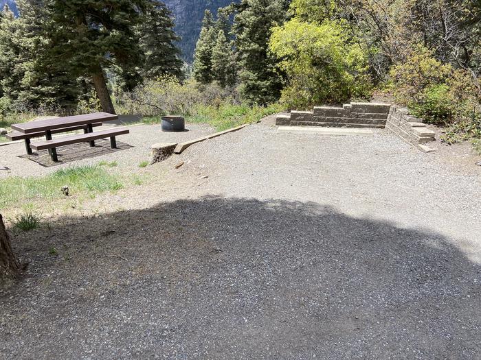 A photo of Site 007 of Loop AMPHITHEATER  at AMPHITHEATER (CO) with Picnic Table, Fire Pit, Tent Pad, Lantern Pole. A nice view. Small parking maximum 20’. 