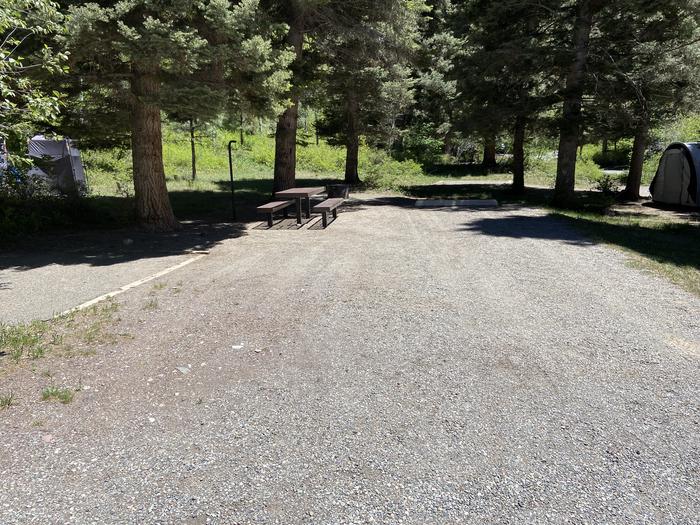 A photo of Site 029 of Loop AMPHITHEATER  at AMPHITHEATER (CO) with Picnic Table, Fire Pit, Tent Pad, Lantern Pole