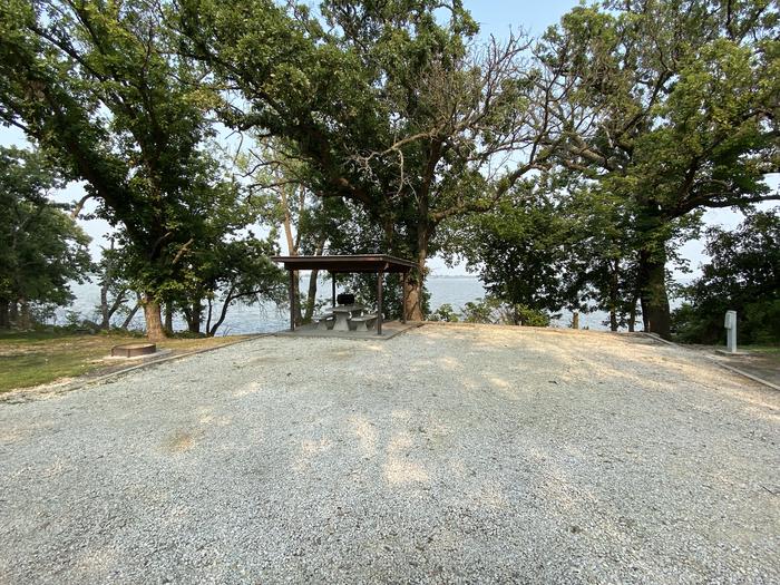 A photo of Site 07 of Loop CCRE at CANNING CREEK with Picnic Table, Electricity Hookup, Fire Pit, Shade, Waterfront, Water Hookup
