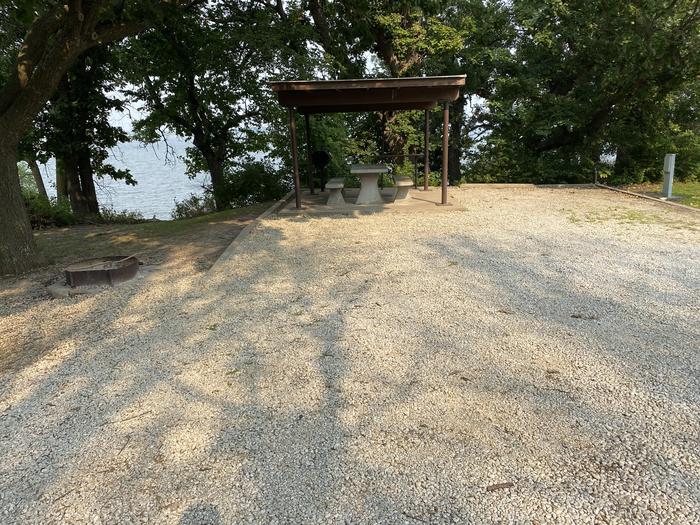 A photo of Site 9 of Loop CCRE at CANNING CREEK with Picnic Table, Electricity Hookup, Fire Pit, Shade, Waterfront, Water Hookup