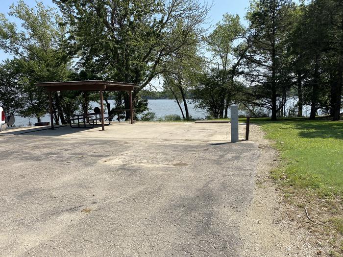 A photo of Site 29 of Loop CCRE at CANNING CREEK with Picnic Table, Electricity Hookup, Fire Pit, Shade, Waterfront, Water Hookup