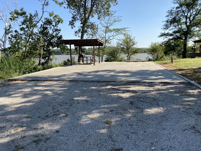 A photo of Site 32 of Loop CCRE at CANNING CREEK with Picnic Table, Electricity Hookup, Fire Pit, Shade, Waterfront, Water Hookup