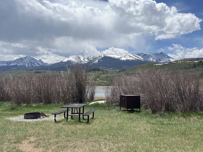 A photo of Site 021 of Loop COW CREEK at COW CREEK SOUTH with Picnic Table, Fire Pit, Food Storage, Tent Pad, Waterfront