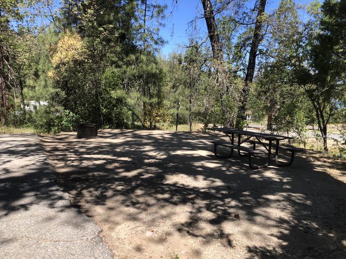A photo of Site 004 of Loop FORKS CAMPGROUND at Forks Campground (Sierra) with Picnic Table, Fire Pit, Shade, next to Restrooms. 
