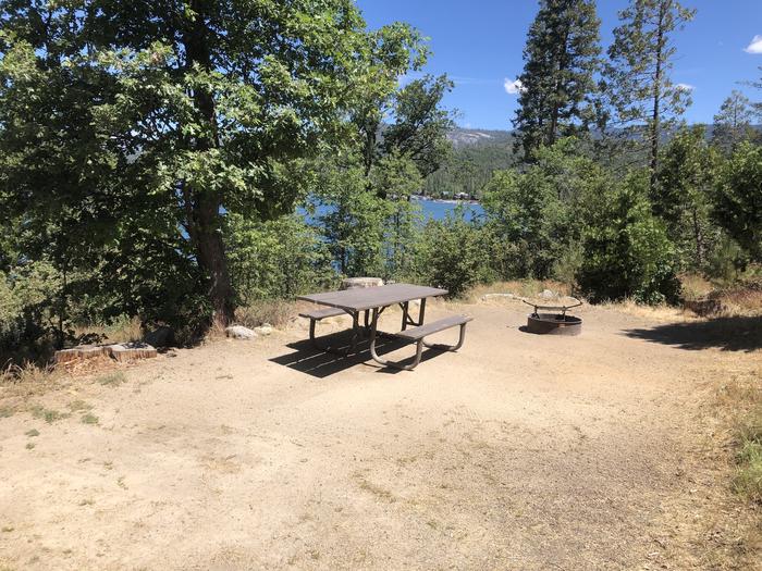 A photo of Site 025 of Loop FORKS CAMPGROUND at Forks Campground (Sierra) with Picnic Table, Fire Pit, Shade, Lake View. 