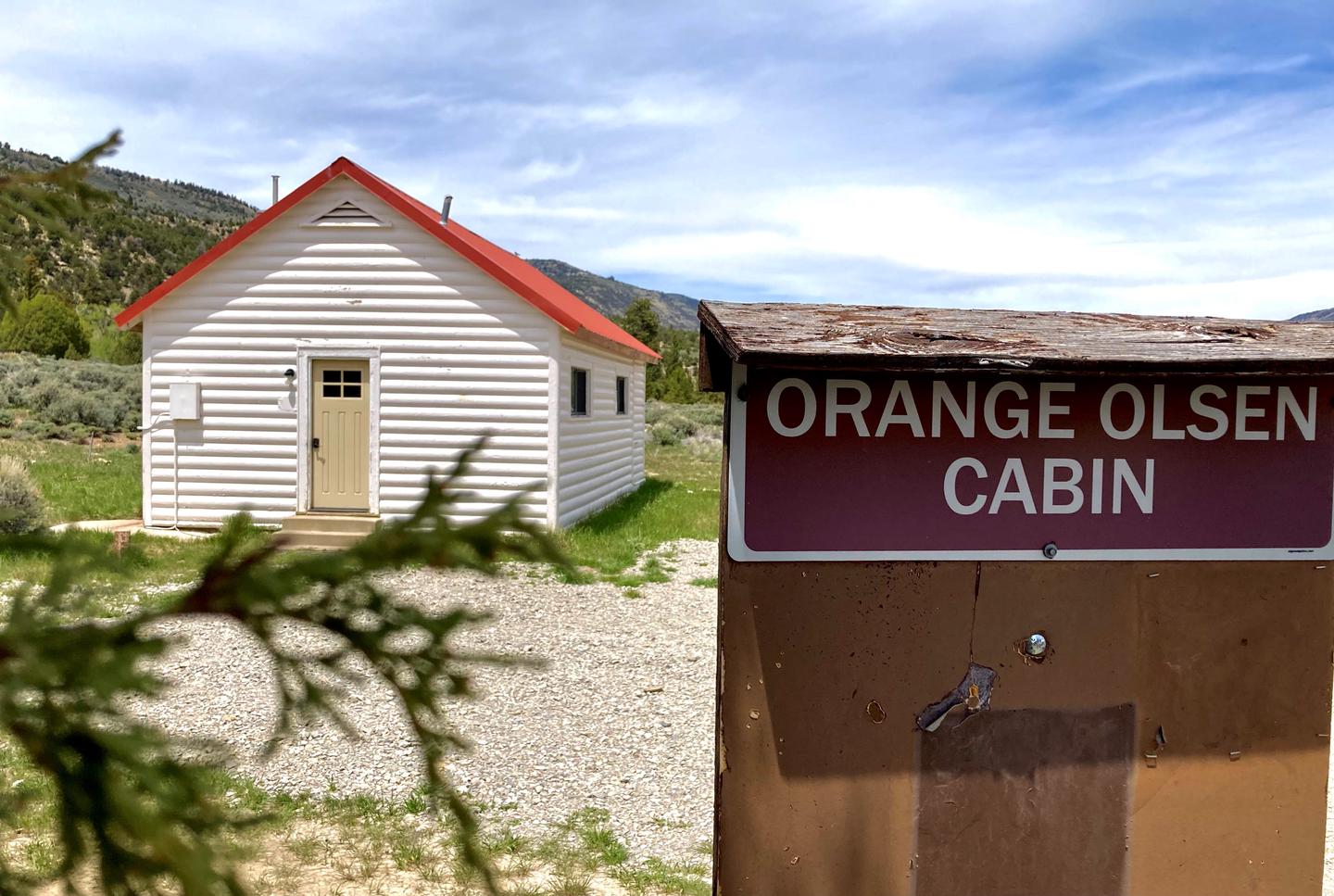 An Orange Olsen Cabin sign marks the structure.An Orange Olsen Cabin sign marks the structure in Joes Valley.
