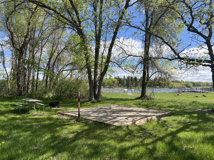 A photo of Site 013 of Loop KNUTSON DAM at Bimijiwan Recreation Area with Picnic Table, Fire Pit, Tent Pad, Waterfront